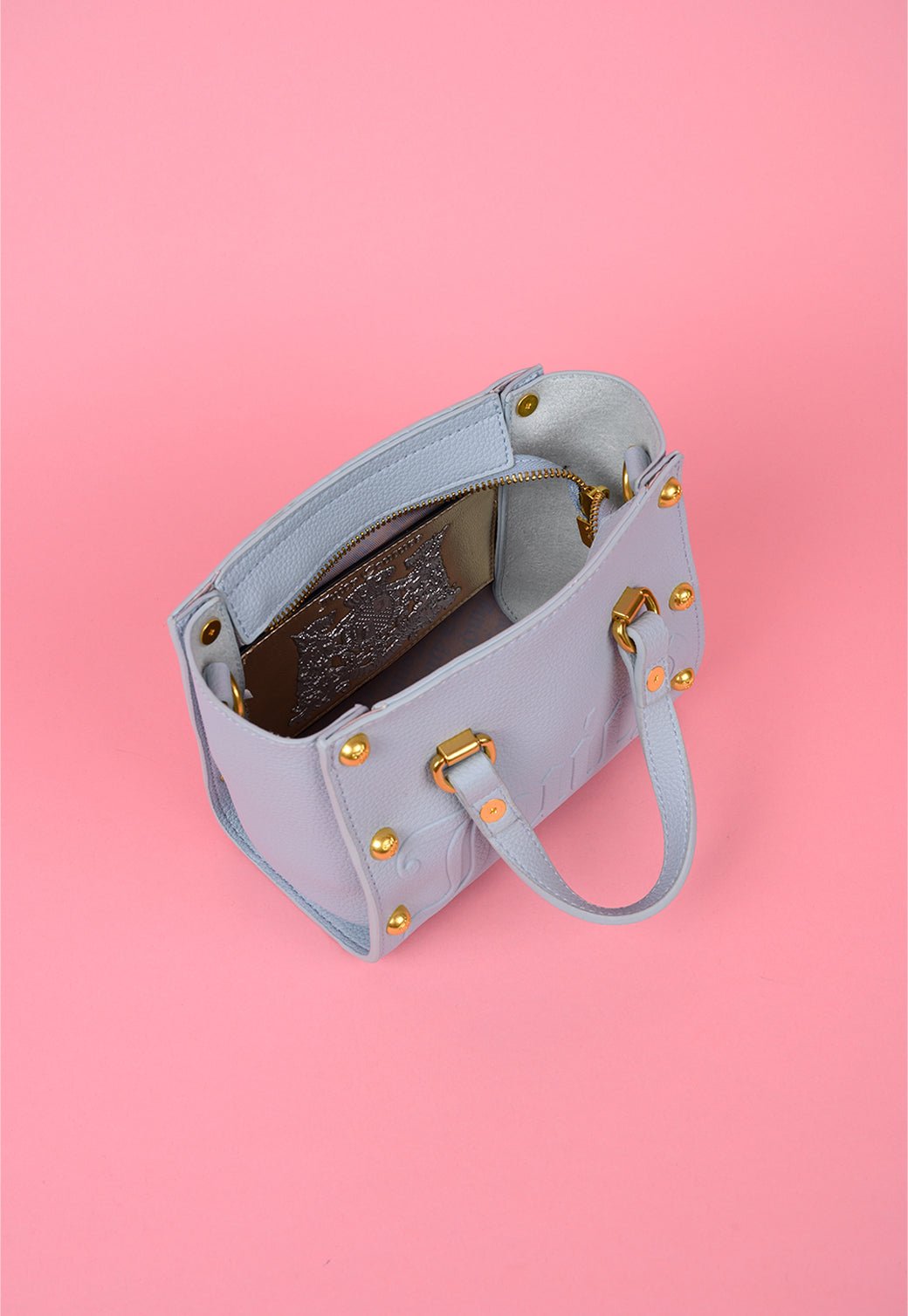 תיק נשיאה עם ניטים ורצועה נשלפת - Juicy Couture