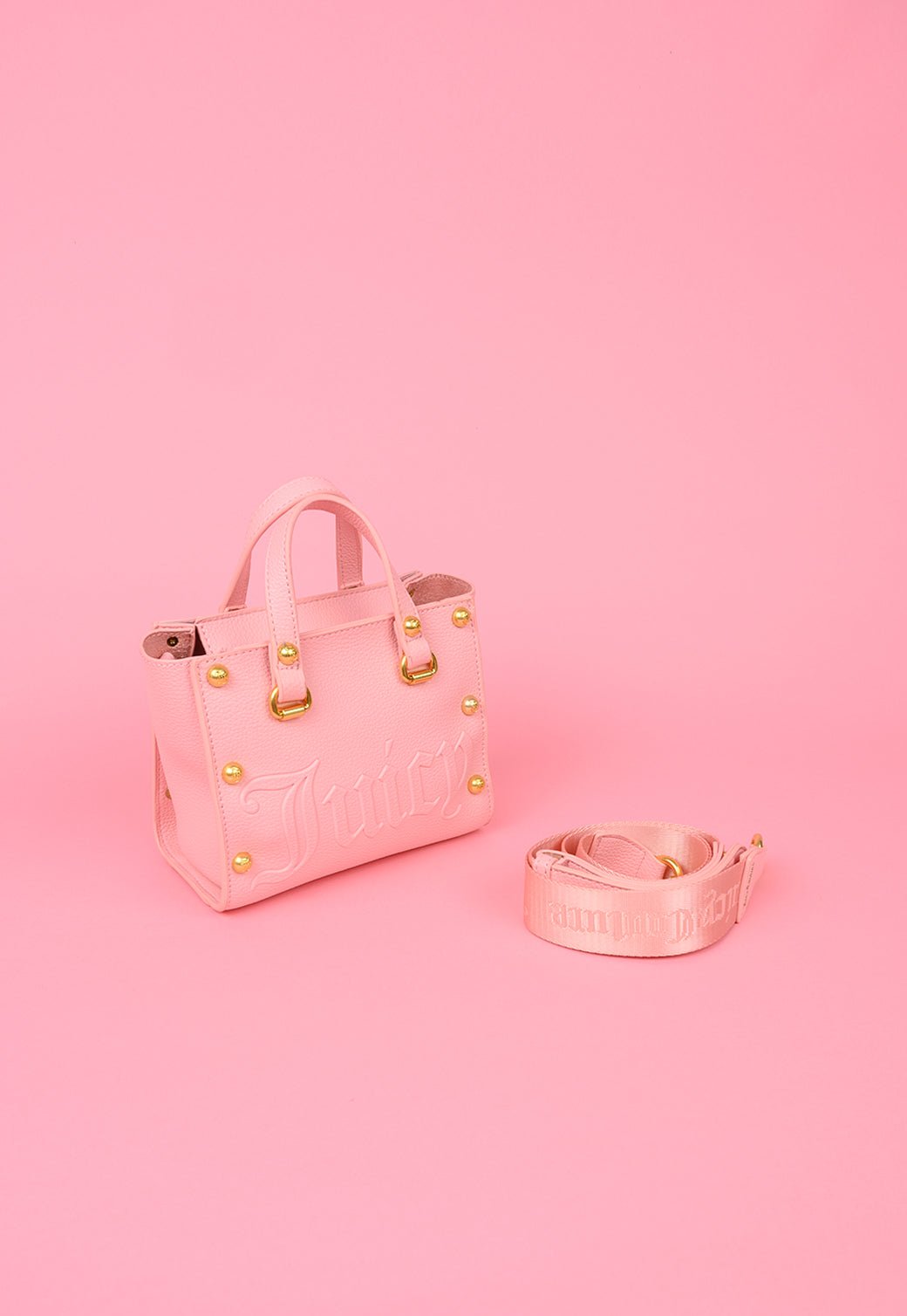 תיק נשיאה עם ניטים ורצועה נשלפת - Juicy Couture